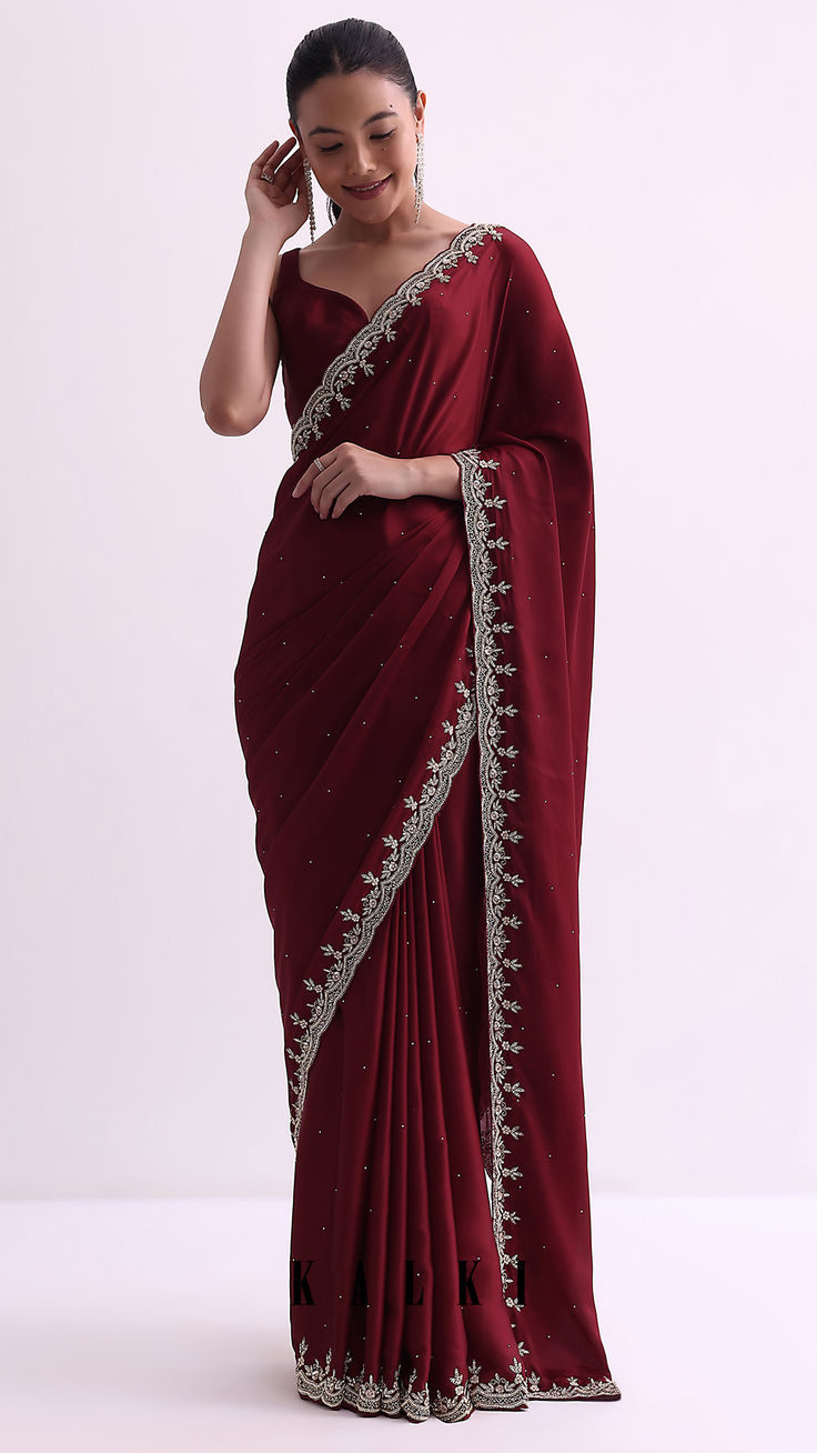 Women Magenta Sheer Saree with Gold Motif Border